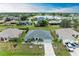 Aerial view of a house near a lake, highlighting its desirable location and neighborhood at 2467 Odessa Ln, Punta Gorda, FL 33983