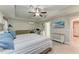 Main bedroom with king-size bed and ensuite access at 2467 Odessa Ln, Punta Gorda, FL 33983