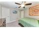 Bedroom with queen bed, dresser and TV at 2467 Odessa Ln, Punta Gorda, FL 33983