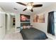 Small bedroom with full-size bed and access to hall bath at 2467 Odessa Ln, Punta Gorda, FL 33983