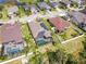 Aerial view showcasing a home with solar panels and a private pool at 2529 Sherman Oak Dr, North Port, FL 34289