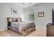 Bedroom with rustic bed frame and window at 2529 Sherman Oak Dr, North Port, FL 34289