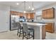 Modern kitchen featuring stainless steel appliances and granite countertops at 2529 Sherman Oak Dr, North Port, FL 34289