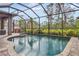 Enjoy this beautiful screened pool and lanai area at 2529 Sherman Oak Dr, North Port, FL 34289