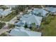 Quaint community with teal-colored buildings at 25533 Heritage Lake Blvd # 19, Punta Gorda, FL 33983