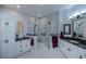 Elegant bathroom with marble shower, double vanity, and ample storage at 25533 Heritage Lake Blvd # 19, Punta Gorda, FL 33983