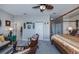 Relaxing bedroom with a sitting area and access to the bathroom at 25533 Heritage Lake Blvd # 19, Punta Gorda, FL 33983