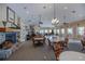 Spacious community room with stone fireplace and multiple seating areas at 25533 Heritage Lake Blvd # 19, Punta Gorda, FL 33983