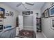 Bright home office with double doors opening to a small storage room at 25533 Heritage Lake Blvd # 19, Punta Gorda, FL 33983
