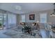 Spacious living room with light gray couch and access to balcony at 25533 Heritage Lake Blvd # 19, Punta Gorda, FL 33983