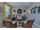 Cozy sitting area with wicker chairs and decorative accents at 25533 Heritage Lake Blvd # 19, Punta Gorda, FL 33983