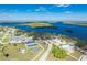 Aerial view of waterfront park with tennis and basketball courts at 27251 Adams St # 212, Punta Gorda, FL 33983