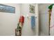 Bathroom with shower stall, decorative wall art, and plenty of storage at 27251 Adams St # 212, Punta Gorda, FL 33983