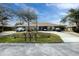 Three-unit building with ample parking and landscaping at 27251 Adams St # 212, Punta Gorda, FL 33983