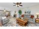 Cozy living room featuring a comfy sofa, coffee table, and tasteful decor at 27251 Adams St # 212, Punta Gorda, FL 33983