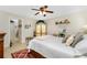 Comfortable main bedroom with king-size bed and ensuite bathroom access at 27251 Adams St # 212, Punta Gorda, FL 33983