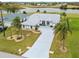 Single-Gathering home with driveway and canal views at 303 San Cristobal Ave, Punta Gorda, FL 33983