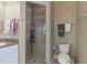 Clean bathroom featuring a glass-enclosed shower and a toilet at 3329 Purple Martin Dr # 121, Punta Gorda, FL 33950