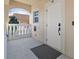 Inviting condo entrance with white door and balcony access at 3329 Purple Martin Dr # 121, Punta Gorda, FL 33950