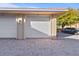 Attached garage with white door and brick pavers at 3329 Purple Martin Dr # 121, Punta Gorda, FL 33950