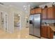 Kitchen with stainless steel appliances and wood cabinets at 3329 Purple Martin Dr # 121, Punta Gorda, FL 33950