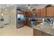 Kitchen with stainless steel appliances and granite countertops at 3329 Purple Martin Dr # 121, Punta Gorda, FL 33950