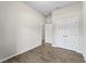 Simple bedroom with tile floors and window at 3733 Basket St, North Port, FL 34288