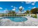 Inviting kidney-shaped pool with patio and golf course view at 3845 Bal Harbor Blvd, Punta Gorda, FL 33950