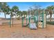 Modern playground with two slides and climbing features at 3861 Cobblestone Ln, Port Charlotte, FL 33980