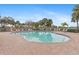 Kidney shaped community pool at 3861 Cobblestone Ln, Port Charlotte, FL 33980