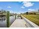 Concrete dock with steps leading to the canal at 500 Belvedere Ct, Punta Gorda, FL 33950