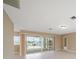 Living room with sliding glass doors leading to pool area at 500 Belvedere Ct, Punta Gorda, FL 33950