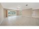 Bright living room with tile floors and large window at 500 Belvedere Ct, Punta Gorda, FL 33950