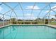 Inviting swimming pool with screened enclosure at 500 Belvedere Ct, Punta Gorda, FL 33950