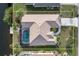 Bird's-eye view of single-Gathering home with pool and lush landscaping at 5430 Almar Dr, Punta Gorda, FL 33950