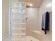 Bathroom with walk-in shower and built-in seat at 5430 Almar Dr, Punta Gorda, FL 33950