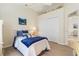 Bright bedroom with built-in closet and hardwood floors at 5430 Almar Dr, Punta Gorda, FL 33950