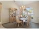 Elegant dining room featuring a beautiful chandelier and hutch at 5430 Almar Dr, Punta Gorda, FL 33950