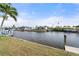 Scenic canal-front property with lush landscaping at 5430 Almar Dr, Punta Gorda, FL 33950