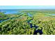 Wide aerial view of a lush, tropical waterway system at 6208 Keating Ave, North Port, FL 34291