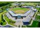 Aerial view of a baseball stadium with surrounding parkland at 6208 Keating Ave, North Port, FL 34291