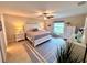 Spacious bedroom with a king-size bed and ample natural light at 6208 Keating Ave, North Port, FL 34291