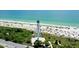 Lighthouse on a beach with white sand and clear water at 6208 Keating Ave, North Port, FL 34291