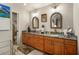 Elegant bathroom with double vanity and granite countertop at 674 Monaco Dr, Punta Gorda, FL 33950