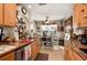 Cozy kitchen with granite countertops and wooden cabinets at 674 Monaco Dr, Punta Gorda, FL 33950