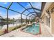 Relaxing screened pool and spa with canal views at 674 Monaco Dr, Punta Gorda, FL 33950