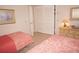 Bedroom with two twin beds and closet at 721 Brenda Ct, Punta Gorda, FL 33950