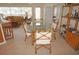 Charming dining area with bamboo chairs and glass top table at 721 Brenda Ct, Punta Gorda, FL 33950