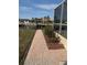 Brick walkway leading to canal and pool at 721 Brenda Ct, Punta Gorda, FL 33950