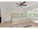 Spacious bedroom with king-size bed and en-suite bathroom at 7249 W Lenox Cir, Punta Gorda, FL 33950